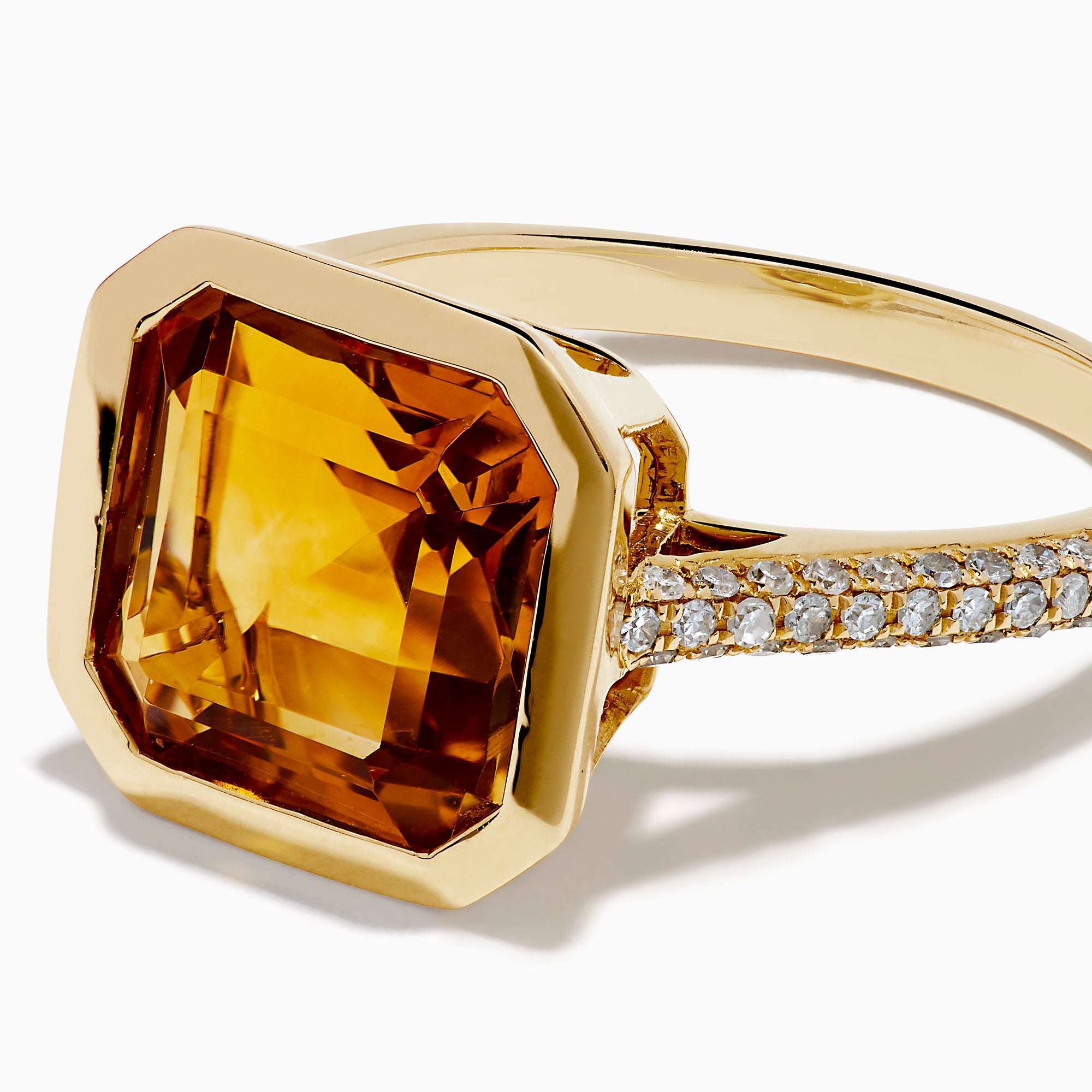The Sunset 14K Yellow Gold Citrine and Diamond Ring showcases a large square-cut citrine center and small diamonds along the band, displayed on a plain white background.