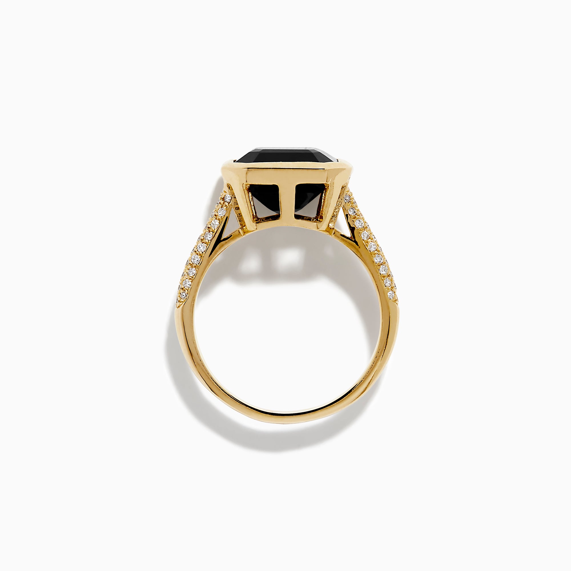 The 14K Yellow Gold Bezel Set Black Onyx and Diamond Ring features a bold square-cut black onyx center stone and sparkling diamonds set along the band.
