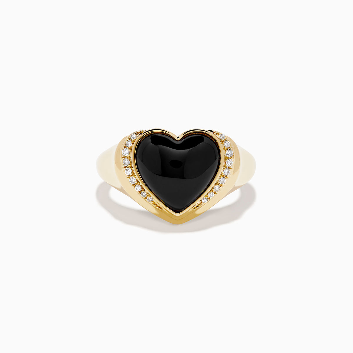 The 14K Yellow Gold Onyx and Diamond Heart Ring features a heart-shaped black onyx centerpiece bordered by sparkling diamonds, creating a romantic and elegant look.