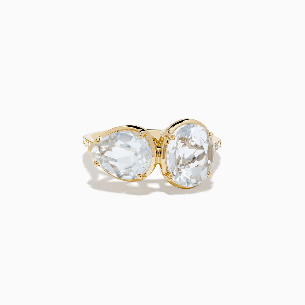 The 14K Yellow Gold White Topaz and Diamond Ring showcases two large, oval-cut white topaz stones set side by side in a minimalist, elegant style on a white background.