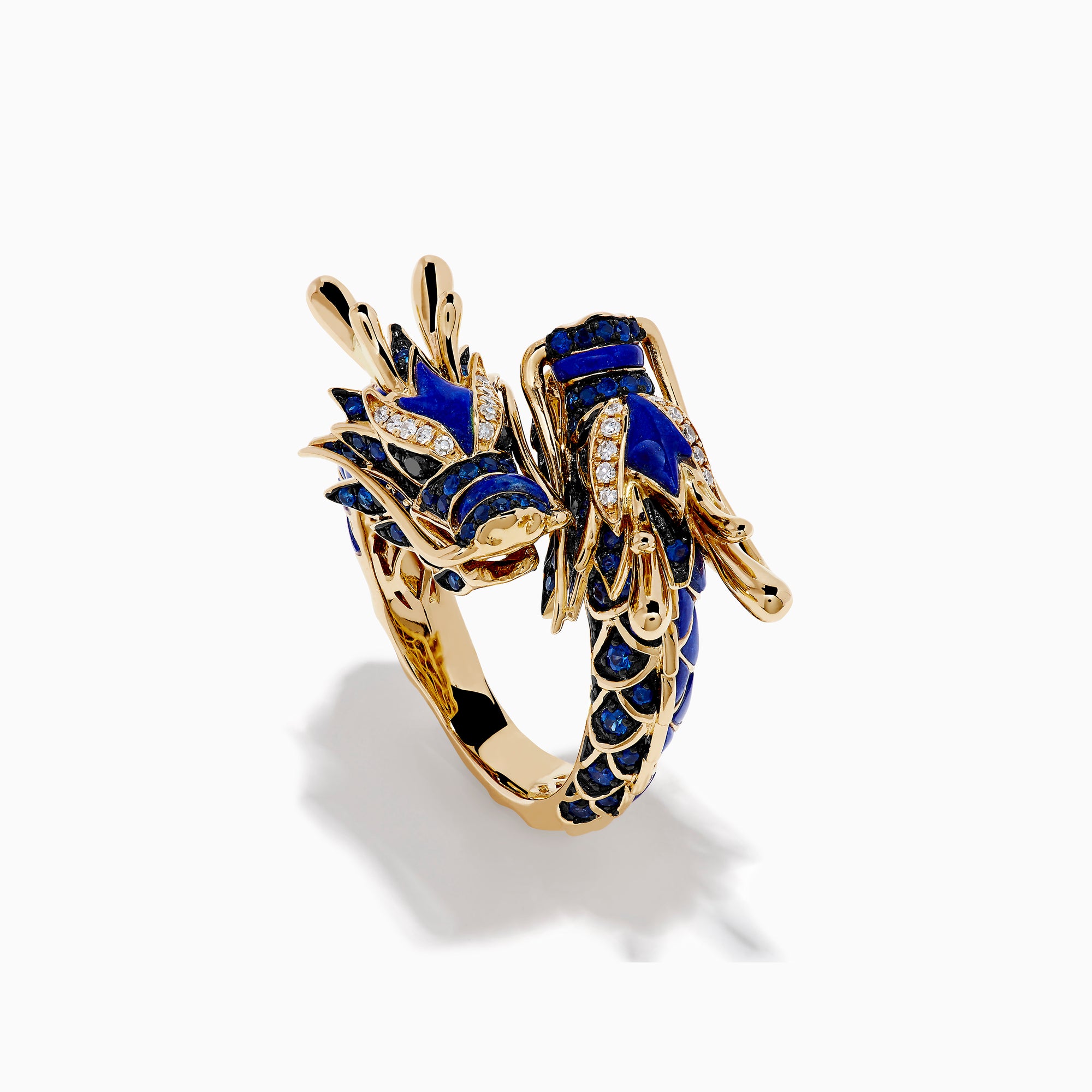 The Safari 14K Yellow Gold Diamond, Lapis and Sapphire Dragon Ring, shaped as a dragon’s head and body, features blue enamel scales and sparkling gemstones, evoking the fierce beauty of a sapphire dragon ring on a white background.