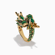 The 14K Yellow Gold Malachite Tsavorite and Diamond Dragon Ring features a coiled dragon adorned with malachite, green tsavorites, black gemstones, and small white diamonds, shown on a plain white background.