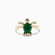 The Seaside 14K Yellow Gold Malachite and Diamond Turtle Ring features a malachite shell and diamond-accented front flippers, beautifully displayed against a plain white background.
