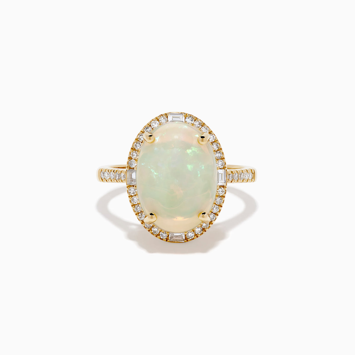 The 14K Yellow Gold Opal and Diamond Halo Cocktail Ring showcases an oval opal centerpiece encircled by a shimmering diamond halo, set against a white background.