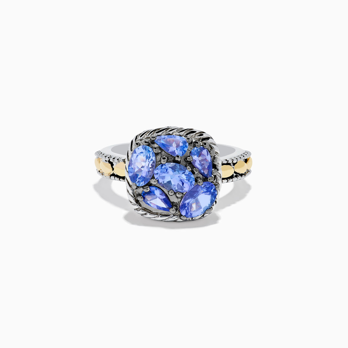 The 925 Sterling Silver and 18K Yellow Gold Tanzanite Ring features intricate rope detailing and a cluster of five marquise and oval blue gemstones, highlighted by yellow gold accents along the band.