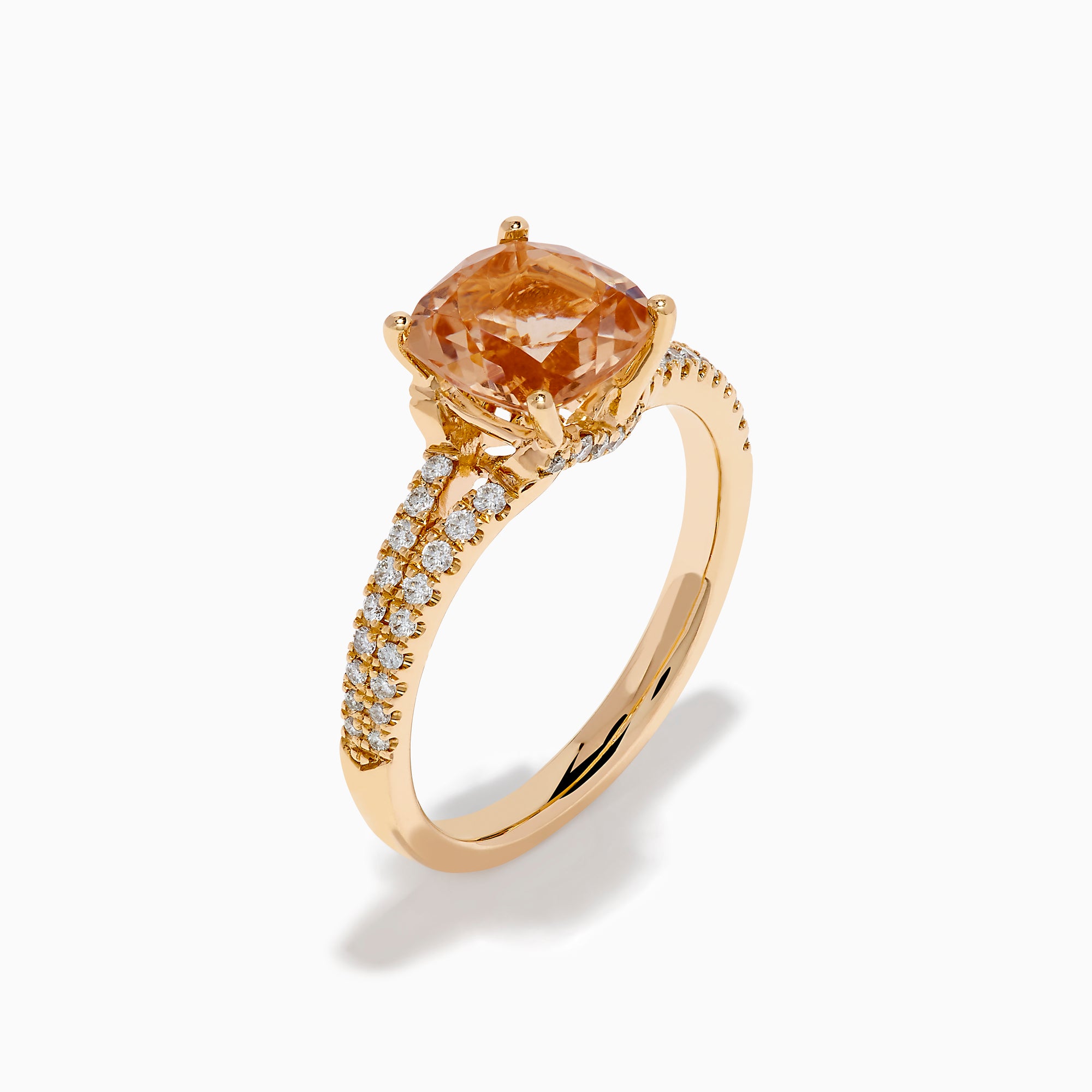 The 18K Rose Gold Morganite and Diamond Split Band Solitaire Ring showcases a large cushion-cut peach morganite center stone, accented by two rows of sparkling white diamonds along the elegant split shank.