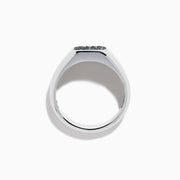 The Men's 925 Sterling Silver Blue Sapphire Signet-style Ring features a rectangular face adorned with small round blue sapphires in a grid pattern, shown on a white background.