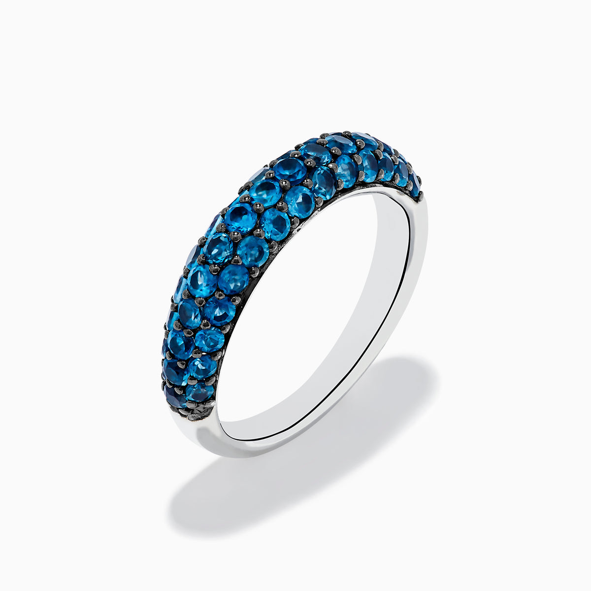 The 925 Sterling Silver London Blue Topaz Wedding Band features two rows of sparkling blue topaz gemstones, beautifully presented on a white background.