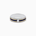 The 925 Mens Sterling Silver Sapphire Ring features a two-tone design with white and yellow metal accents, a central square diamond, and a channel-set row of square blue sapphires along the band.