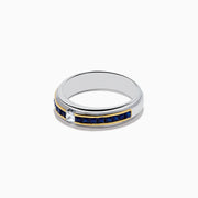 The 925 Mens Sterling Silver Sapphire Ring features a two-tone design with white and yellow metal accents, a central square diamond, and a channel-set row of square blue sapphires along the band.