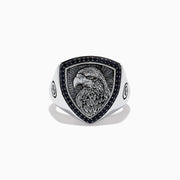 The Mens 925 Sterling Silver Black Spinel Eagle Shield Ring features an engraved eagle head on a shield-shaped face, accented with black spinel and detailed feather patterns on the eagle.