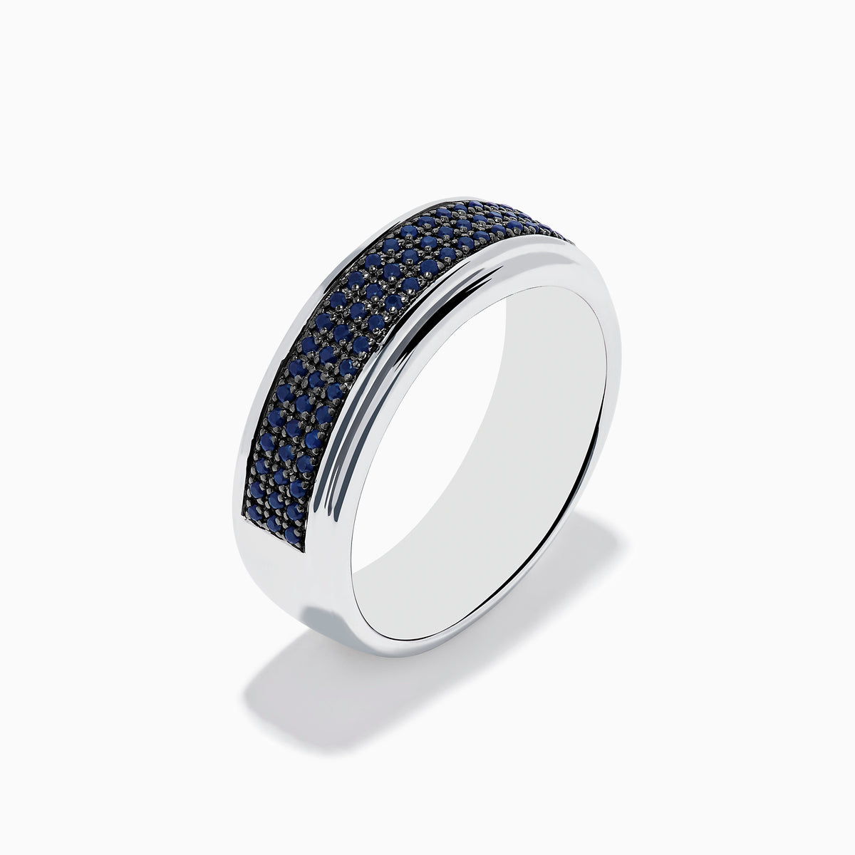 The Mens 925 Sterling Silver Black Sapphire Band Ring features a wide sterling silver band with a central row of black sapphires, creating an elegant mens ring displayed against a plain white background.
