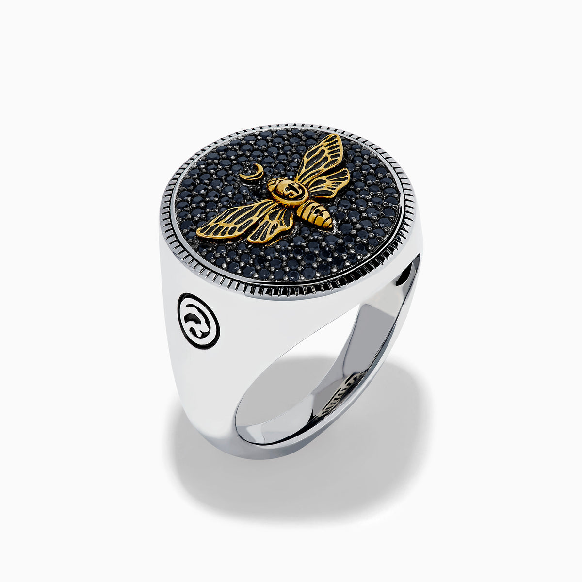 The Men's Sterling Silver Black Spinel Moth Ring showcases a gold moth and crescent moon on a round navy face, accented with sparkling black spinel stones.
