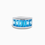 The Ocean Bleu 925 Sterling Silver Blue Topaz Ring features seven rectangular blue topaz gemstones set in a row across the front.