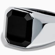 The Men's 925 Sterling Silver Onyx Ring showcases a wide band with a large rectangular black onyx set in the center, shown against a plain white background.