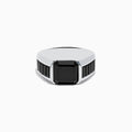 The Mens 925 Sterling Silver Black Spinel Ring showcases a large square-cut black spinel at its center, accented with smaller rectangular stones on each side of the band. Displayed on a white background, its a sophisticated choice for men.