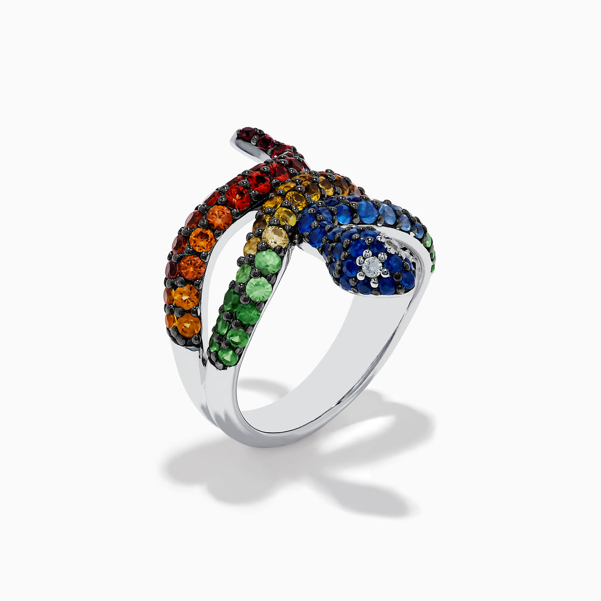 The 925 Safari Sterling Silver Multi Sapphire Snake Ring features a coiled design with blue, green, yellow, orange, and red sapphire gemstones on sterling silver, displayed against a plain white background.