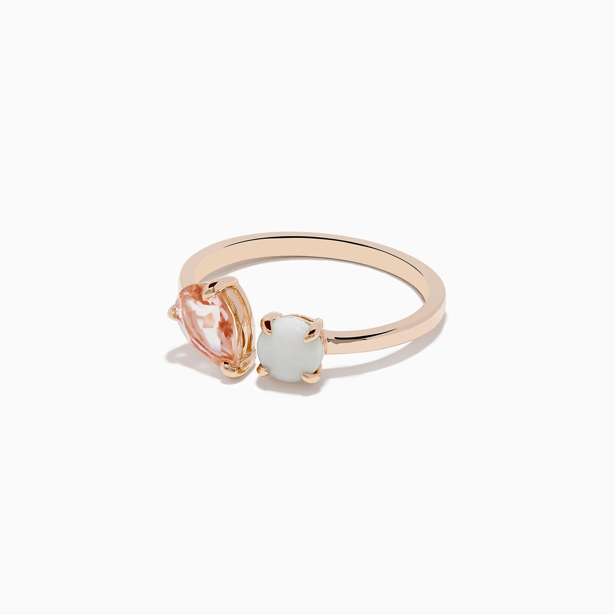 The Aurora 14K Rose Gold Opal and Morganite Toi Et Moi Ring features an asymmetrical design with a pear-shaped pink morganite and a round white opal set side by side against a plain white background.