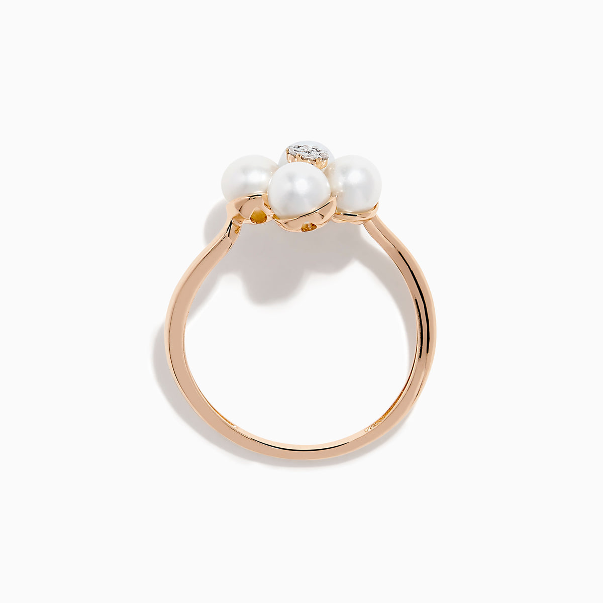 The 14K Rose Gold Fresh Water Pearl and Diamond Flower Ring features petal-shaped pearls and a central cluster of small diamonds, beautifully displayed on a white background.