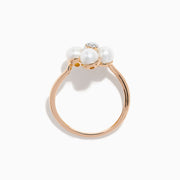 The 14K Rose Gold Fresh Water Pearl and Diamond Flower Ring features petal-shaped pearls and a central cluster of small diamonds, beautifully displayed on a white background.