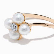 The 14K Rose Gold Fresh Water Pearl and Diamond Flower Ring features petal-shaped pearls and a central cluster of small diamonds, beautifully displayed on a white background.