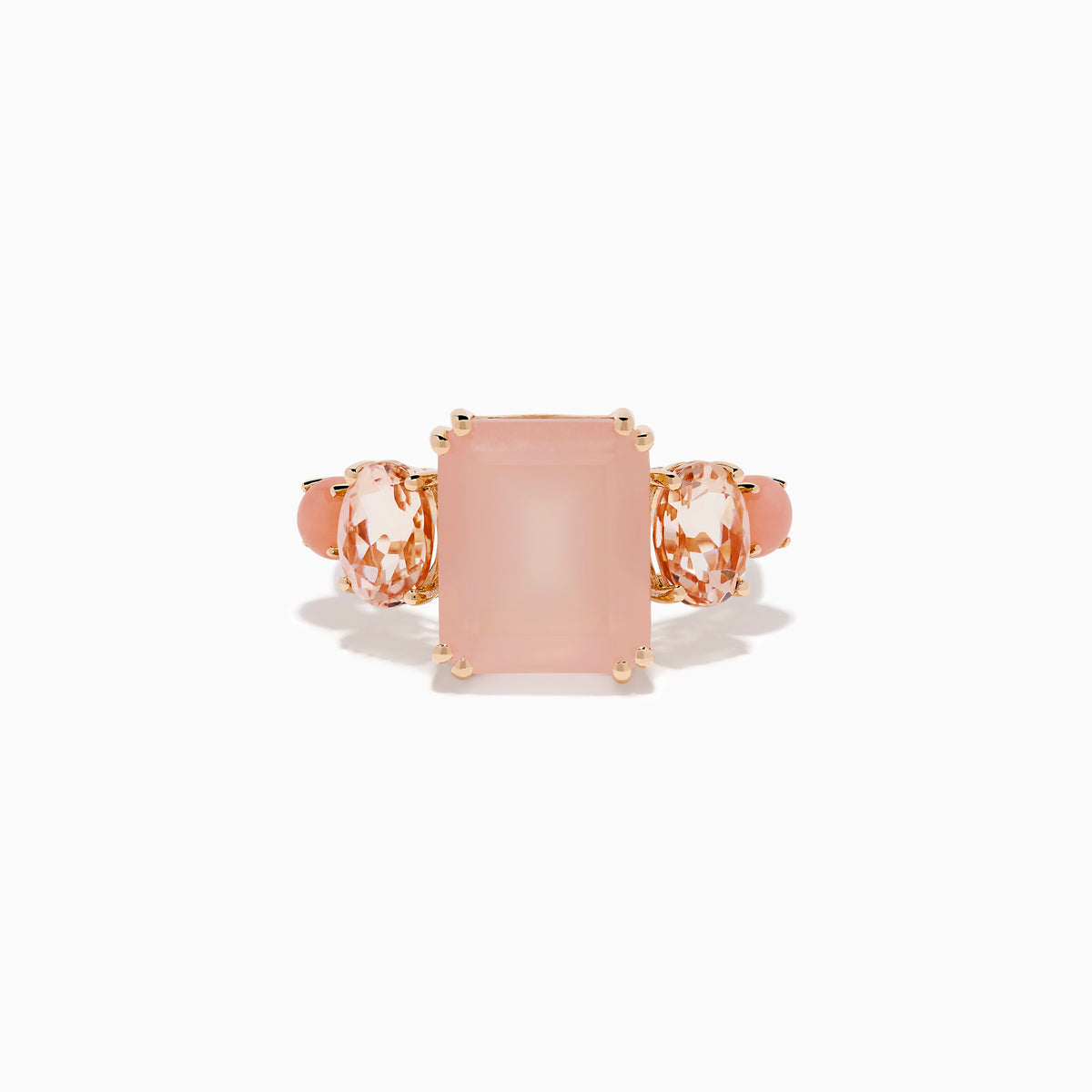 The 14K Rose Gold Pink Rose Quartz, Pink Opal and Morganite Ring features a large rectangular pink quartz center, flanked by two oval pink opals on a simple band, shown against a white background.