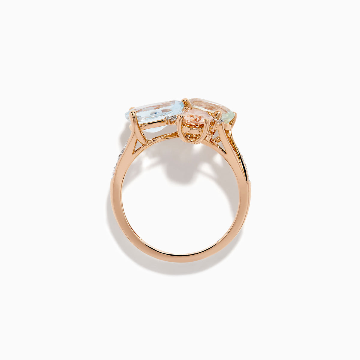 The 14K Rose Gold Semi Precious Mix Stone and Diamond Ring features three bold gemstones in peach, light green, and light blue, accented with diamonds on a rose gold band. Displayed on a white background.