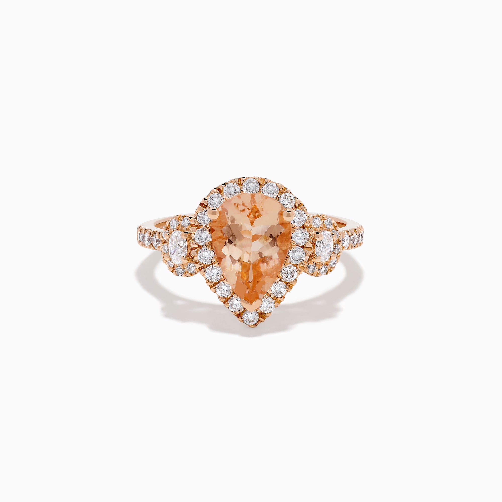 The 14K Rose Gold Pear Morganite and Diamond Halo Ring showcases a peach-hued pear morganite with sparkling diamond halo and accents, all set in 14K rose gold, against a white background.