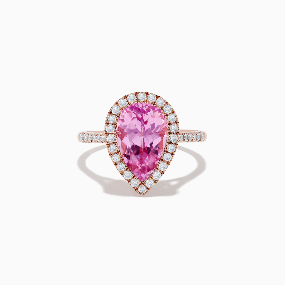 The 14K Rose Gold Kunzite and Diamond Ring features a pear-shaped pink kunzite center stone, surrounded by a halo of small white diamonds, set in a rose gold band and photographed on a plain white background.