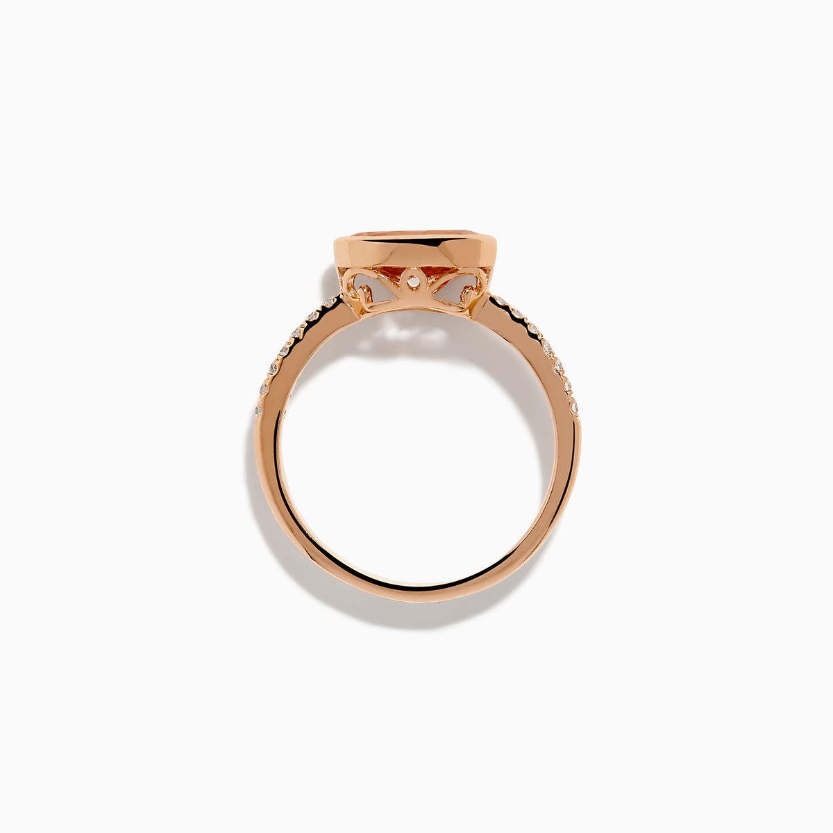 The 14K Rose Gold Morganite and Diamond East West Bezel Ring showcases a striking round peach morganite center stone with small diamonds along the band, set against a white background.