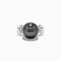 The 14K White Gold Tahitian Pearl and Diamond Ring showcases a large round Tahitian pearl at the center, accented by sparkling diamonds on each side, all set against a plain white background.