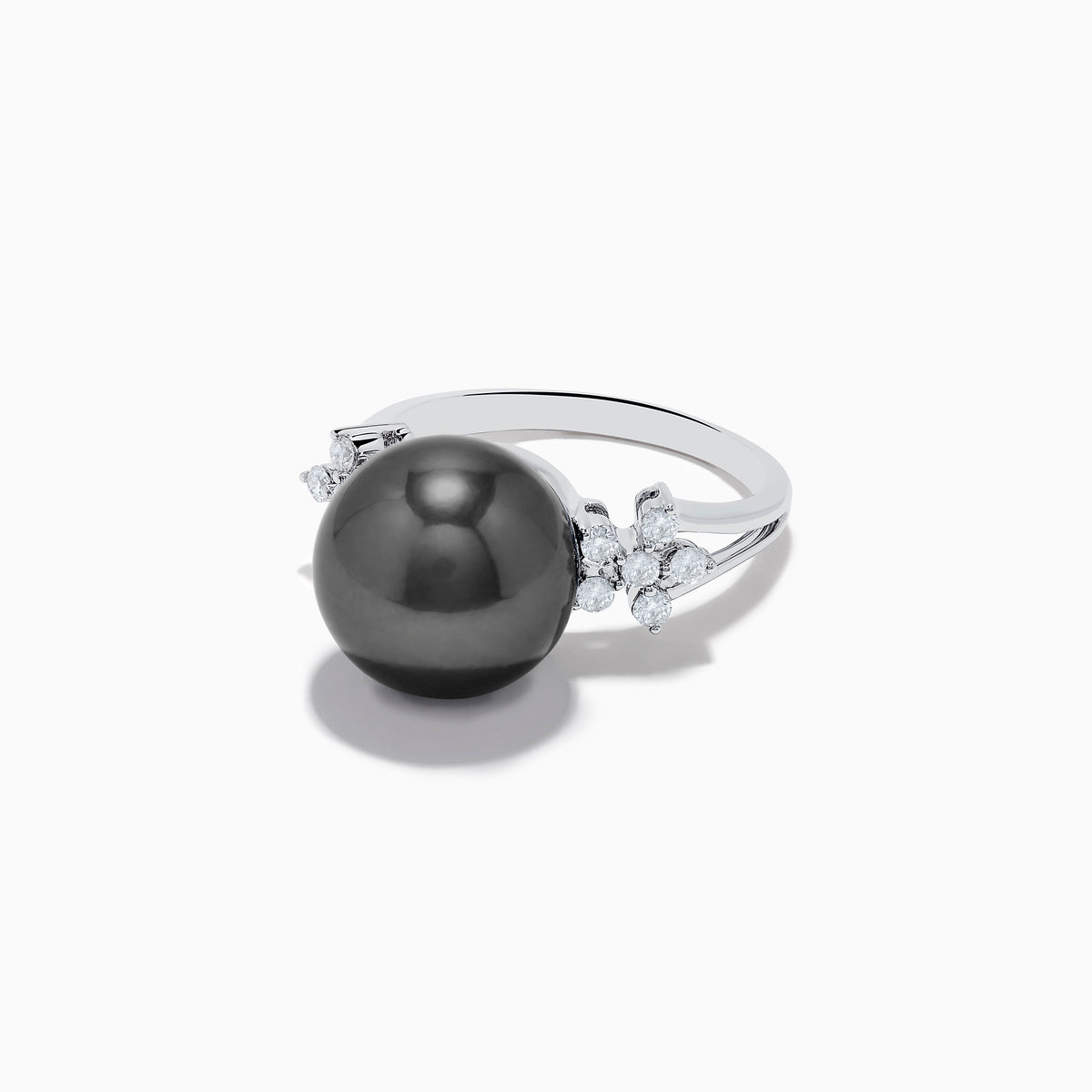 The 14K White Gold Tahitian Pearl and Diamond Ring showcases a large round Tahitian pearl at the center, accented by sparkling diamonds on each side, all set against a plain white background.