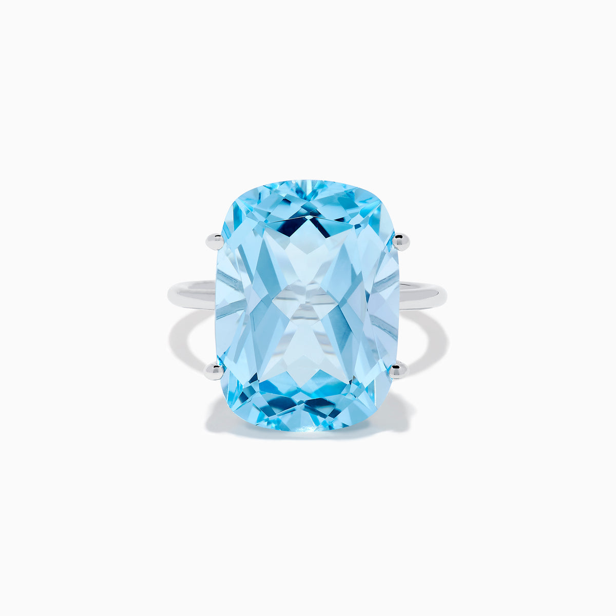 The Ocean Bleu 14K White Gold Sky Blue Topaz Ring features a large cushion-cut gemstone, showcased against a plain white background.