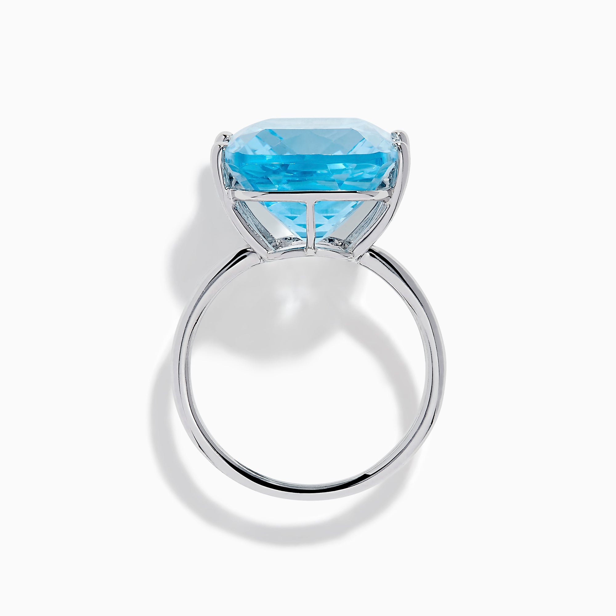 The Ocean Bleu 14K White Gold Sky Blue Topaz Ring features a large cushion-cut gemstone, showcased against a plain white background.