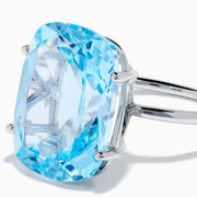 The Ocean Bleu 14K White Gold Sky Blue Topaz Ring features a large cushion-cut gemstone, showcased against a plain white background.