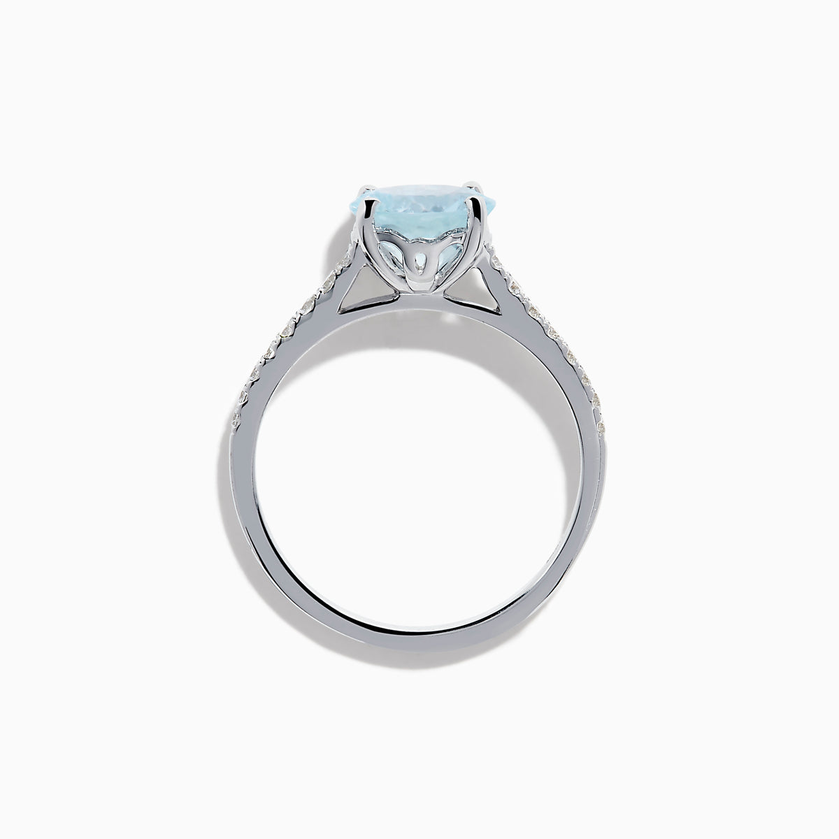 The Aquarius 14K White Gold Aquamarine and Diamond Ring showcases a large oval aquamarine centerpiece with sparkling diamonds along the band, elegantly displayed on a plain white background.