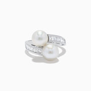 A 14K white gold ring featuring two fresh water pearls and a split band accented with diamonds, displayed on a white background.