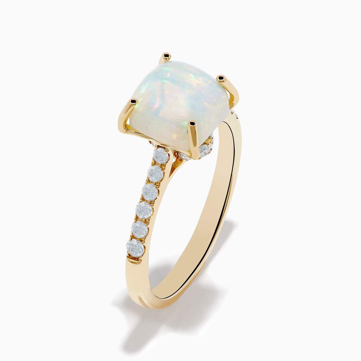 The Aurora 14K Yellow Gold Opal and Diamond Ring features a rectangular opal center accented by small round diamonds along the band, shown against a white background.