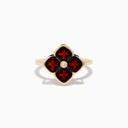 A 14K yellow gold ring featuring a red clover-shaped design in garnet with four gold-outlined petals and a small round diamond at the center.
