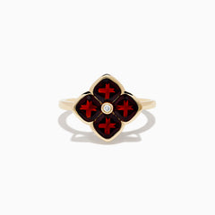 A 14K yellow gold ring featuring a red clover-shaped design in garnet with four gold-outlined petals and a small round diamond at the center.