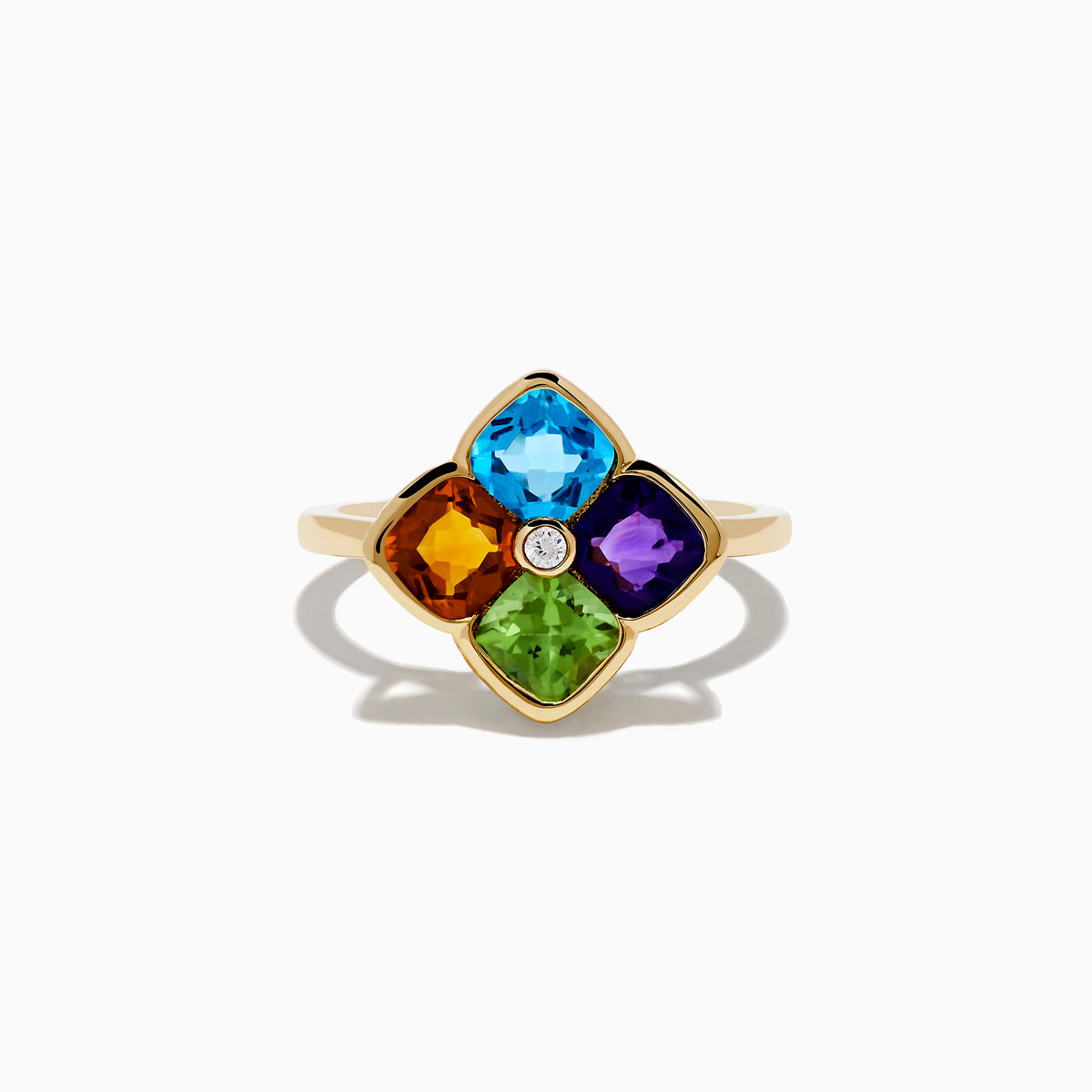The Mosaic 14K Yellow Gold Multi Color Gemstone and Diamond Ring features blue, orange, purple, and green gemstones in a floral pattern with a central round white gemstone.