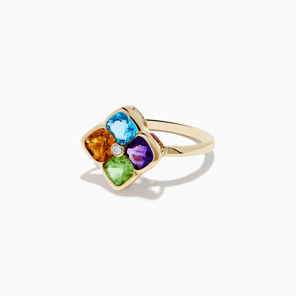 The Mosaic 14K Yellow Gold Multi Color Gemstone and Diamond Ring features blue, orange, purple, and green gemstones in a floral pattern with a central round white gemstone.