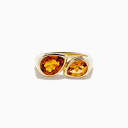 The Sunset 14K Yellow Gold Citrine Bypass Ring showcases two pear-shaped citrine gemstones set side by side on a yellow gold band.