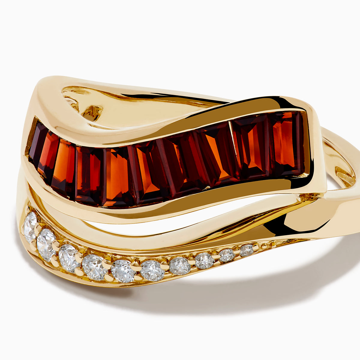 The 14K Yellow Gold Garnet and Diamond Wavy Band features a unique design with one band set with rectangular garnets and the other adorned with round white diamonds.