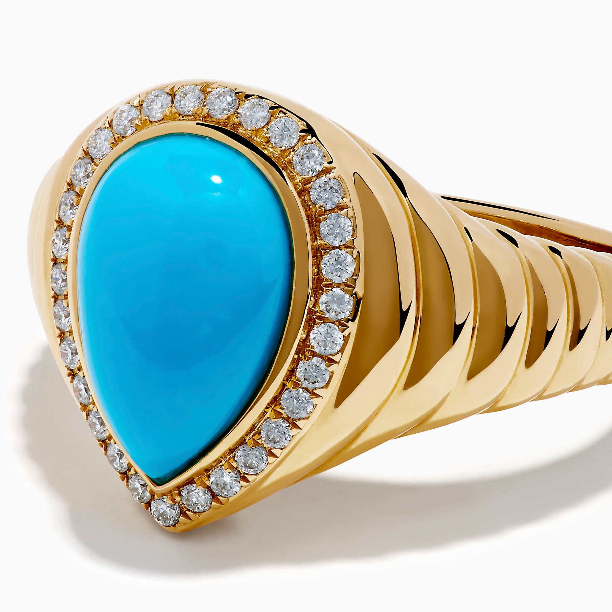 The 14K Yellow Gold Turquoise and Diamond Pear Halo Dome Ring features a teardrop-shaped turquoise center stone, encircled by a sparkling halo of small diamonds in a pear-shaped design, displayed on a white background.