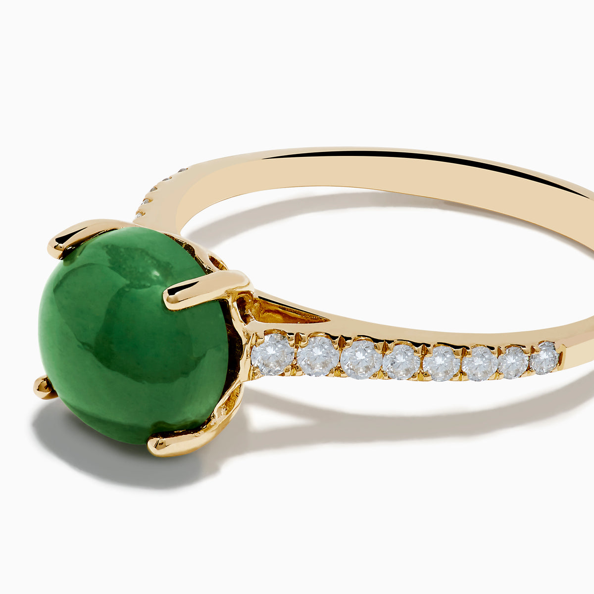 The 14K Yellow Gold Dyed Jade Ring Diamond Ring features a large round dyed jade center stone with small white diamonds set along the band.