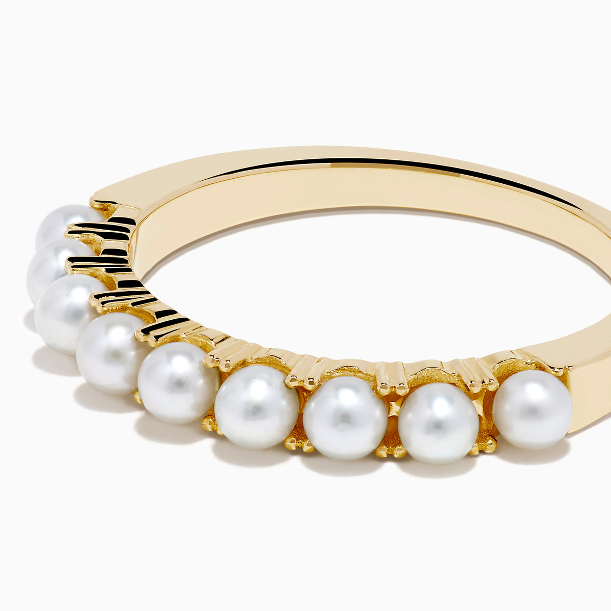 The 14K Yellow Gold Cultured Fresh Water Pearl Band features a row of small, round cultured freshwater pearls set along the top and is shown on a white background.