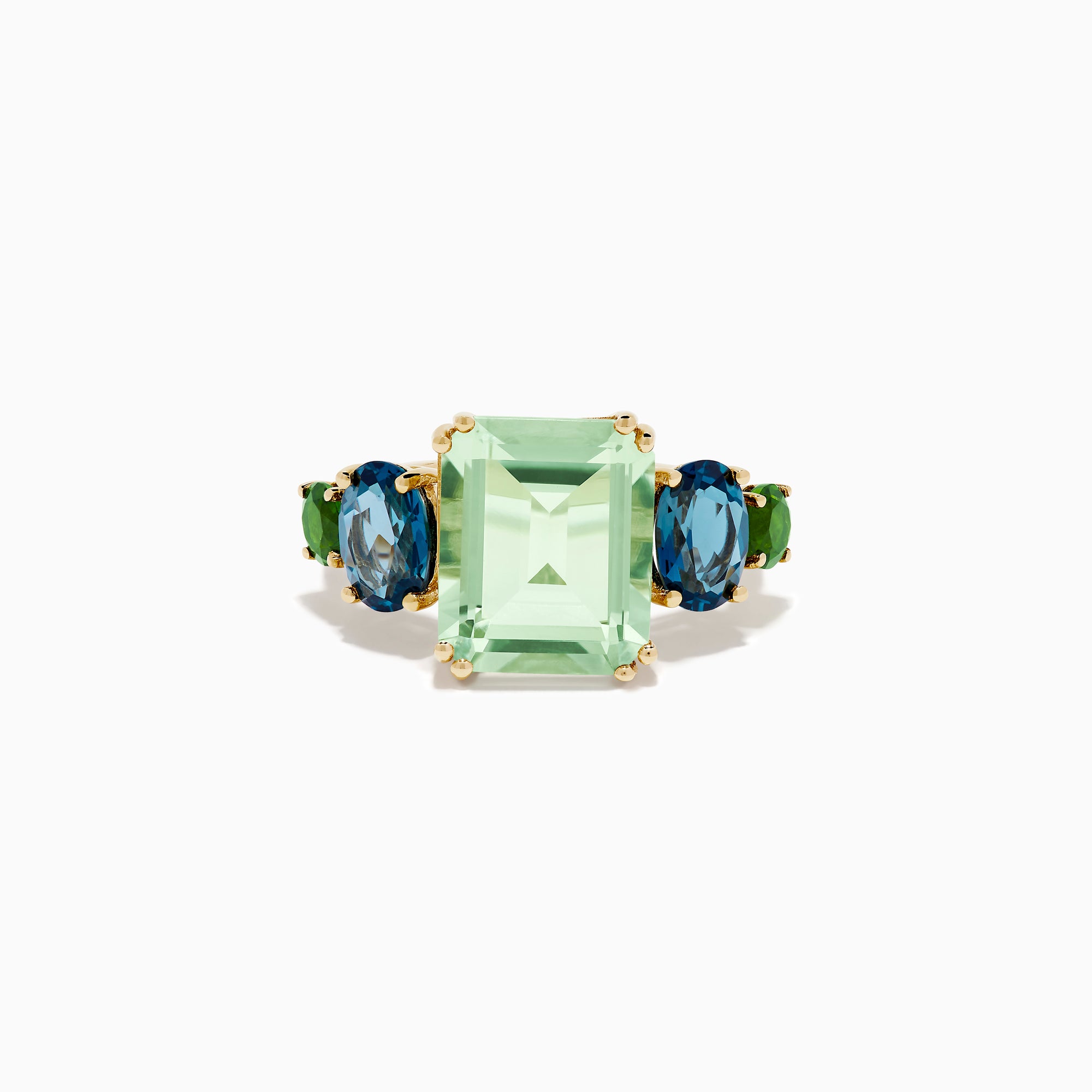The 14K Yellow Gold Amethyst, Blue Topaz, and Chrome Diopside Cocktail Ring features a large rectangular amethyst center stone, flanked by two oval blue topaz and two smaller chrome diopside stones on each side.