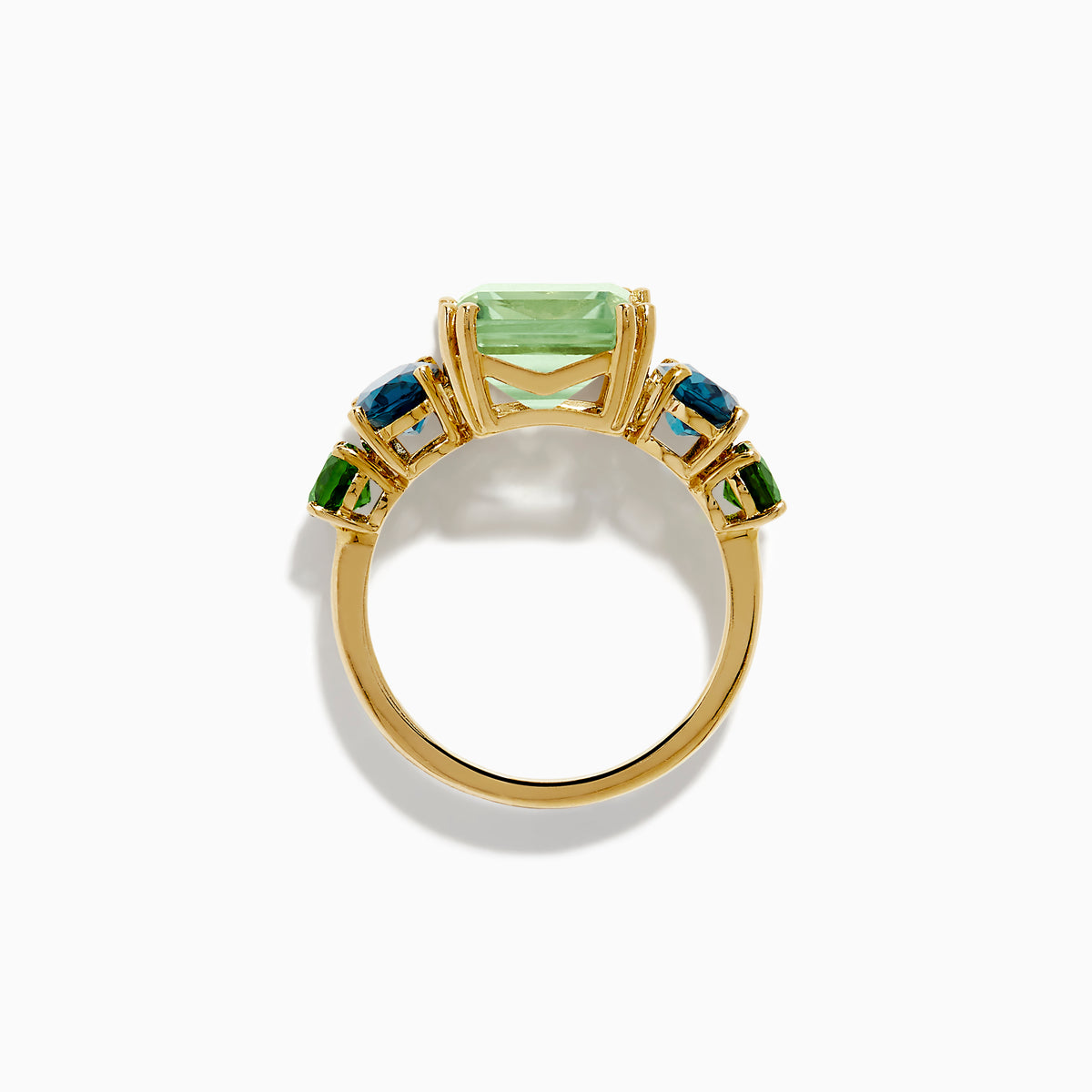 The 14K Yellow Gold Amethyst, Blue Topaz, and Chrome Diopside Cocktail Ring features a large rectangular amethyst center stone, flanked by two oval blue topaz and two smaller chrome diopside stones on each side.
