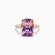 The 14K Yellow Gold Ametrine and Diamond Ring features a vivid purple and pink rectangular ametrine, accented by small round diamonds on each side of the band, shown against a white background.